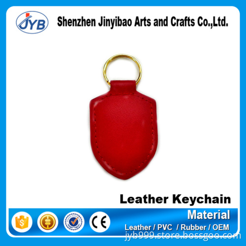 good quality red rubber name keychain shaped in shield